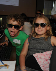 Two kids loving the Code For Kids program