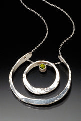 Peridot pendant with recycled sterling silver