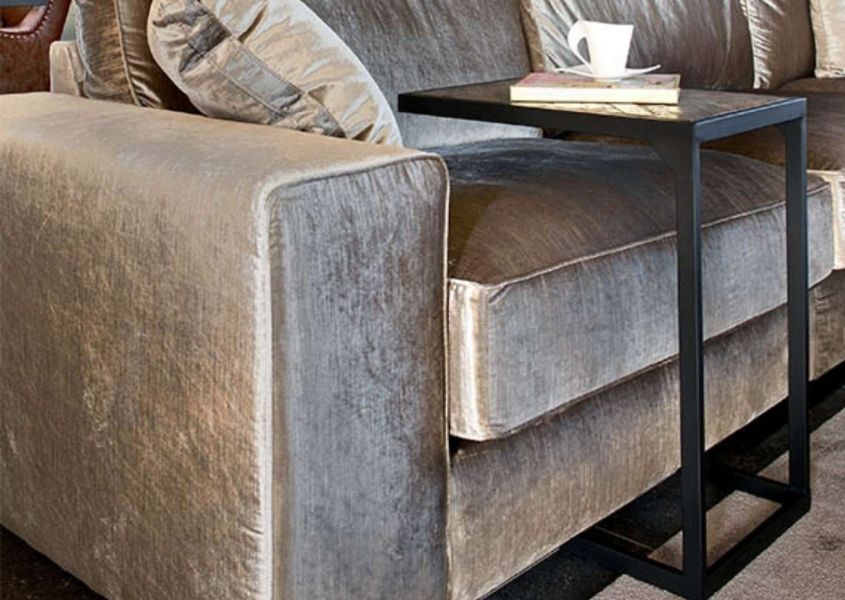 velvet sofa with reclaimed wood side table