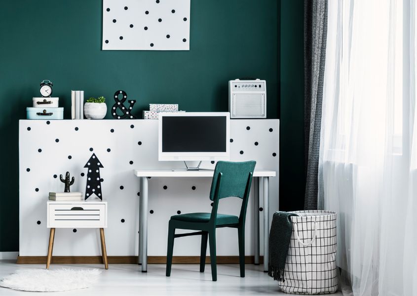 home study area with green feature wall