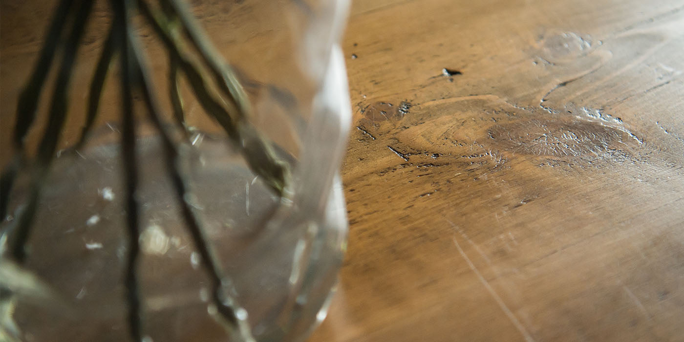 closeup of reclaimed wood dining table