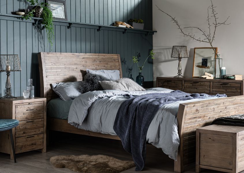reclaimed wood bedroom furniture collection with dark painted panelled wall