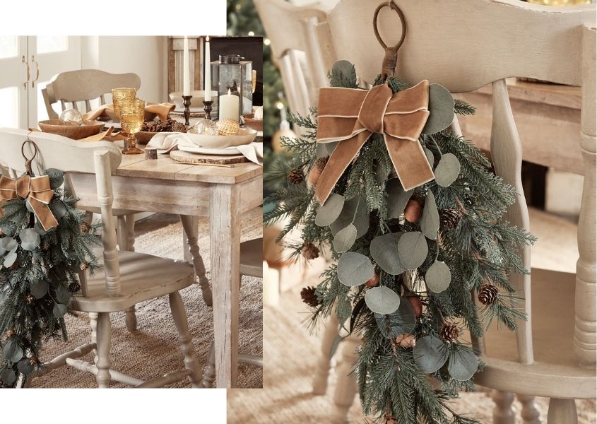 Christmas hanging decorations on back of wooden dining chair