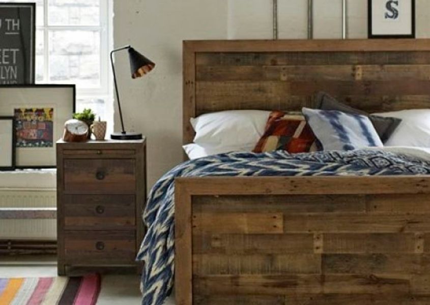 Reclaimed wood bed and matching side table with white and blue bed covers