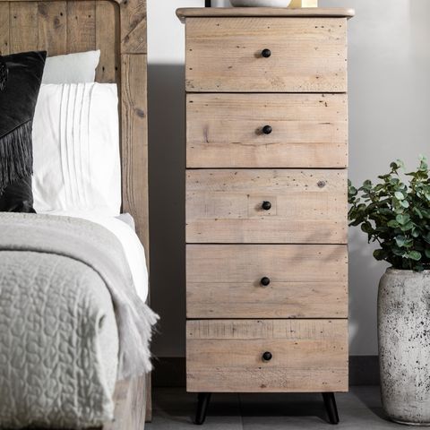 tall wooden chest of drawers