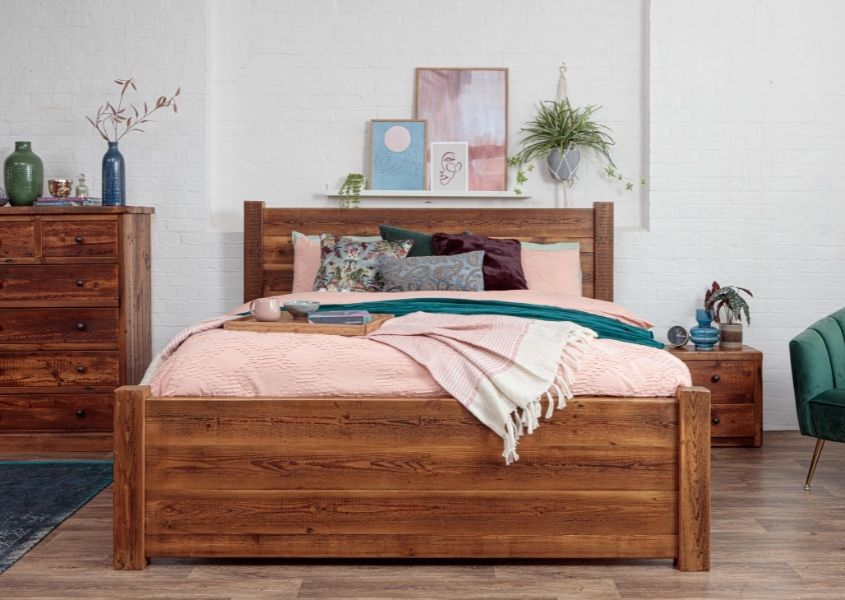 reclaimed solid wood bed frame with pink covers