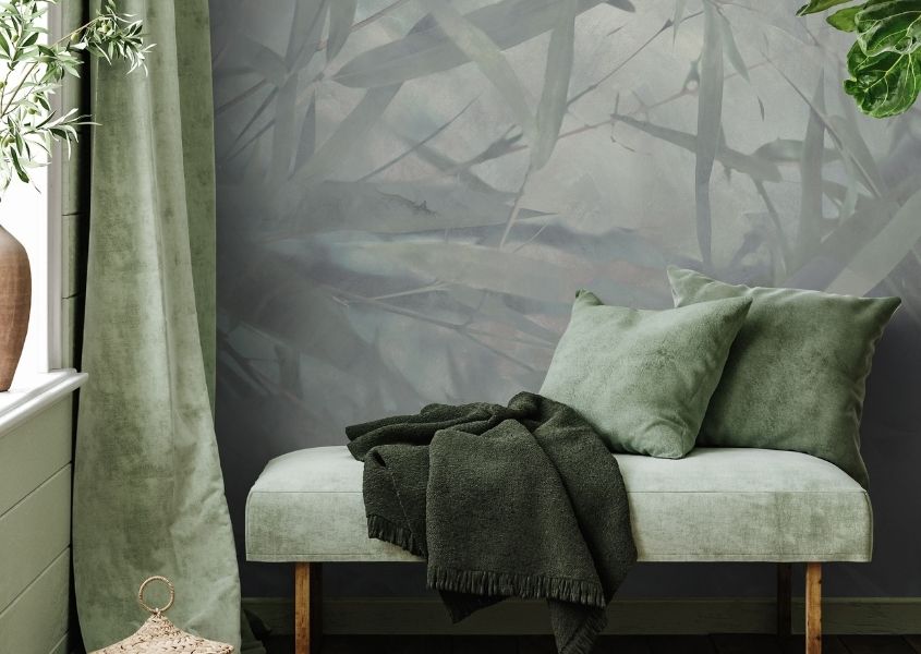 bamboo patterned wallpaper with pale green sofa