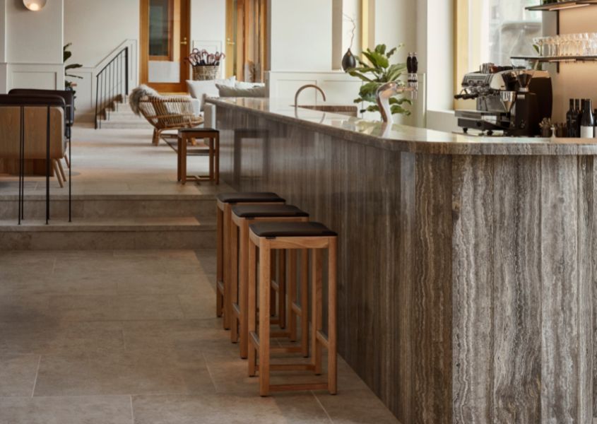 wooden bar stools with leather seat at hotel bar