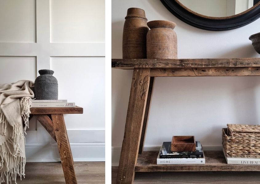 Rustic wood console table and reclaimed wood bench with stone vases