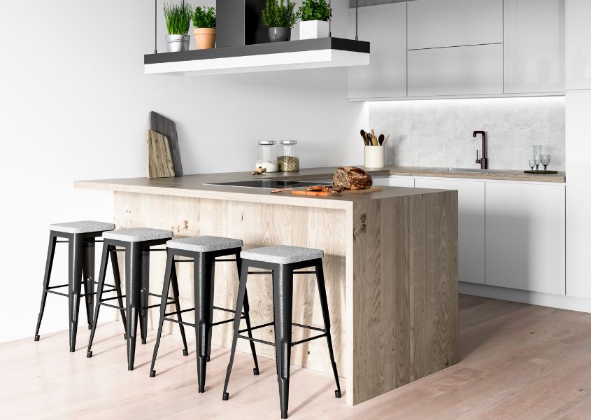 small kitchen with breakfast bar and metal bar stools