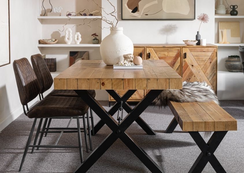 industrial dining table with black metal cross leg and matching wooden dining bench