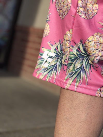 pink pineapple swim trunks