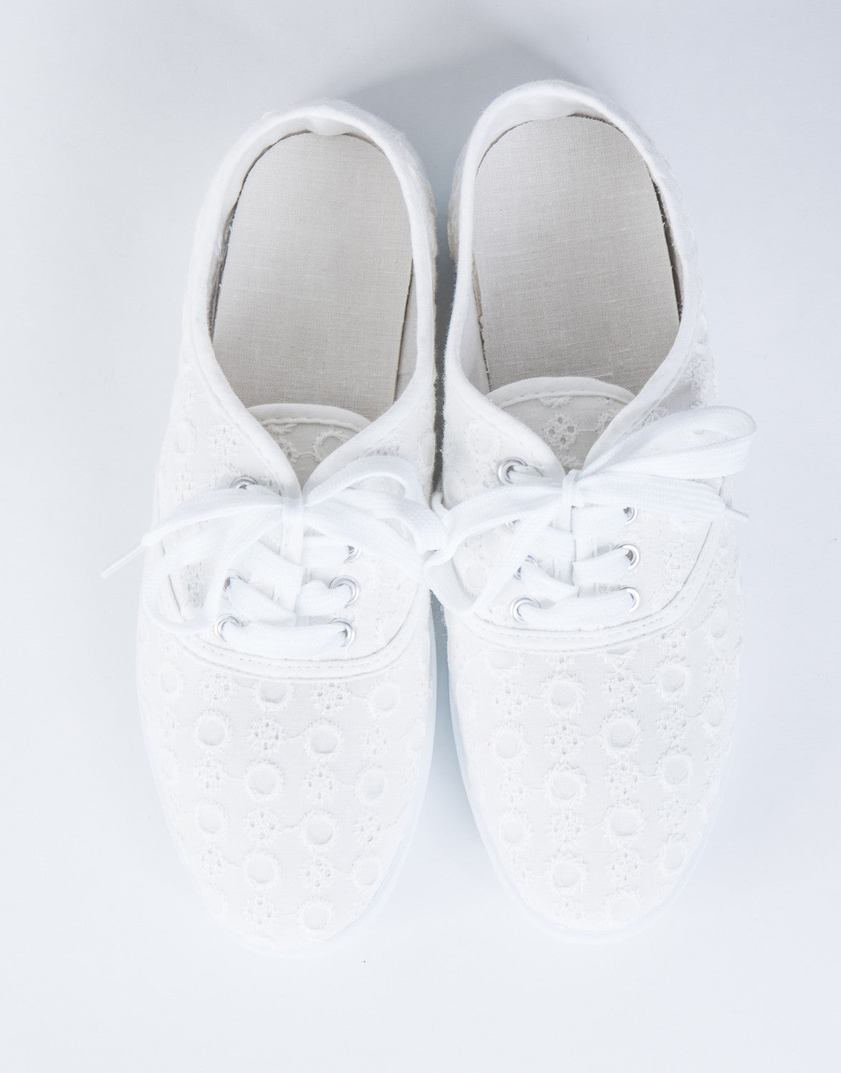 white sneakers with embroidery