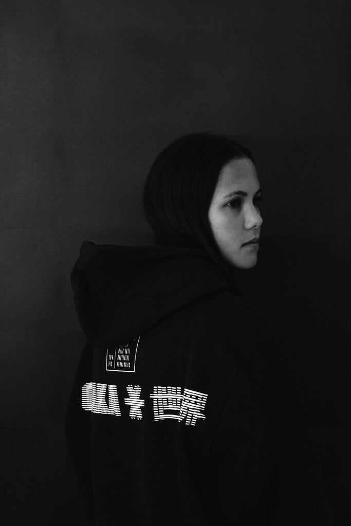 Image of Robyn Johnson wearing an Osaka brand hoodie