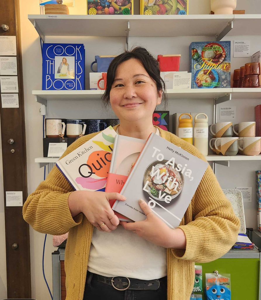 Jenn Zipp holding cookbooks