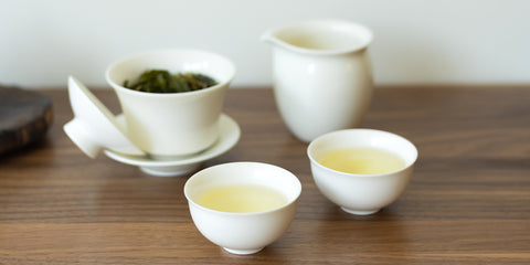 two cups and green tea gaiwan