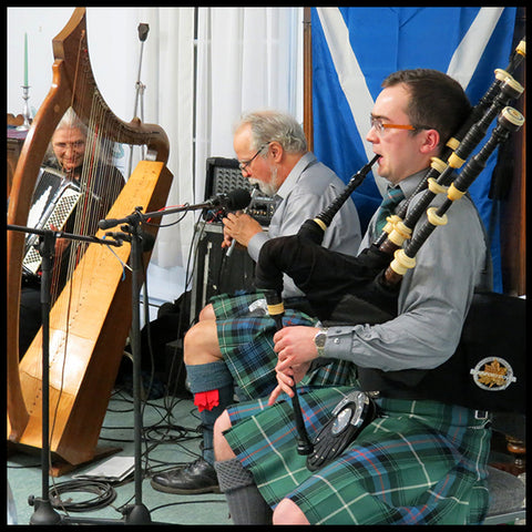 Kate and Mark Cushing perform with Andrew Hutton at the 2017 Burns Supper.