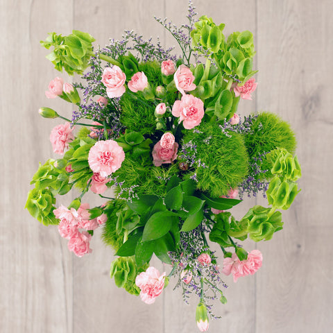 Green Trick, Bells of Ireland, Limmonium, Italian Ruscus, Pink Mini Carnations zodiac flowers capricorn