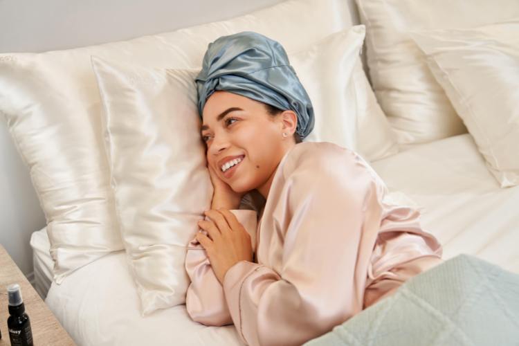 woman protecting fine strands with fine silk bonnet