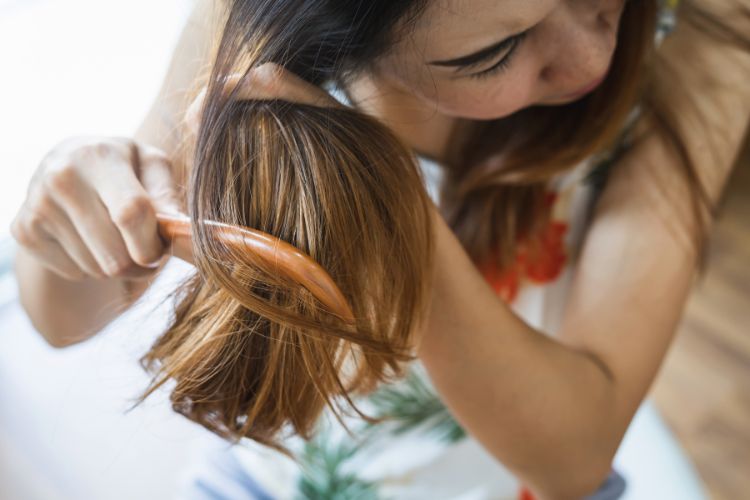 brushing hair