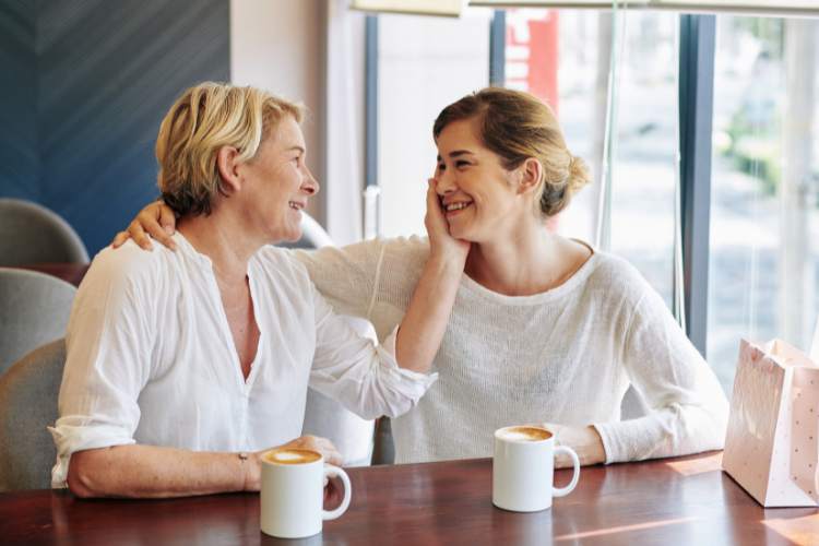 mother and daughter drinking coffee