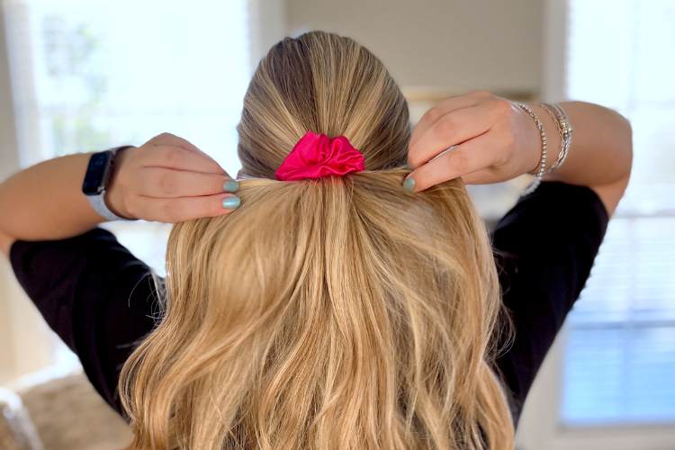 half ponytail with hot pink scrunchie