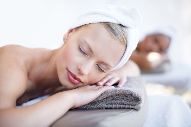 woman relaxing with hair in towel