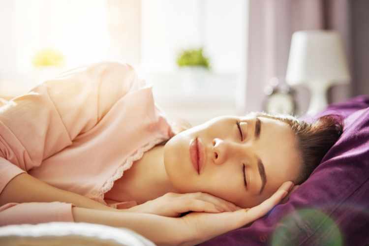 woman improving overall health with sleep