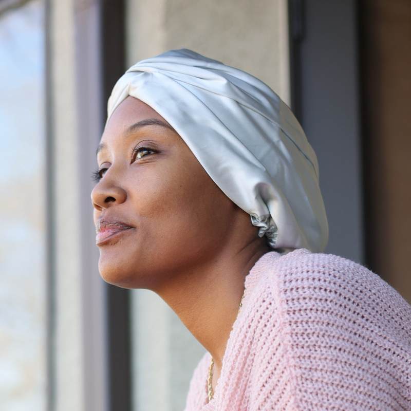 woman wearing double lined silk hair bonnet