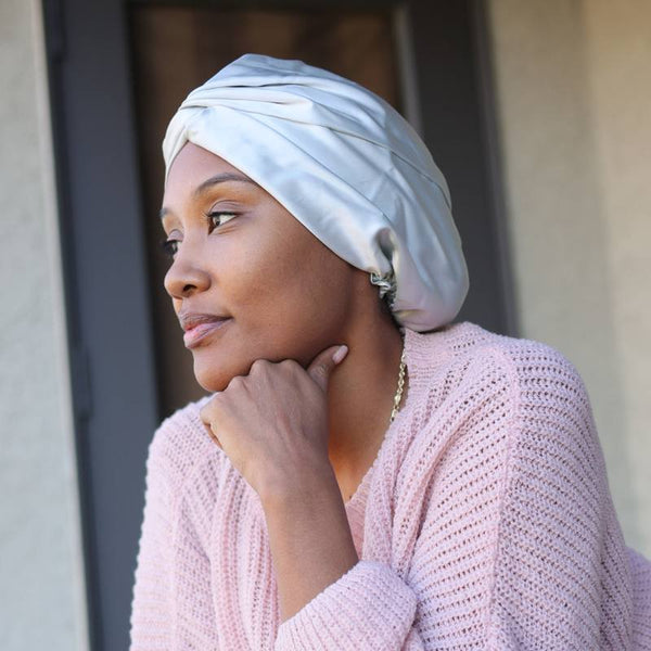 woman wearing hair bonnet for thick hair