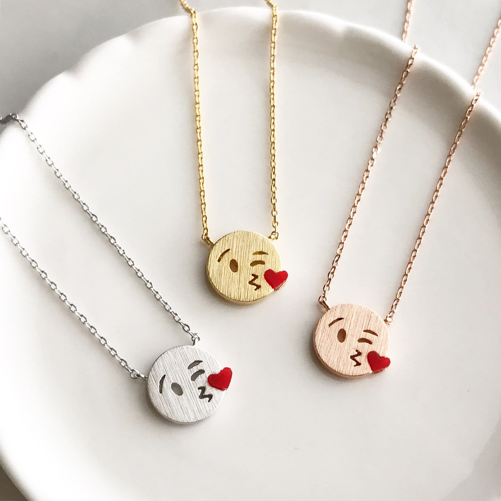 Kissy emoji necklace