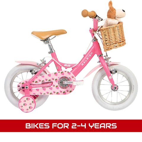 Bikes for 2-4 years featuring a pink Raleigh Molli 12 bike.