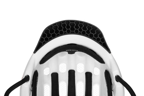 Woom kids helmet soft rubber visor bumper with integrated honeycomb structure.