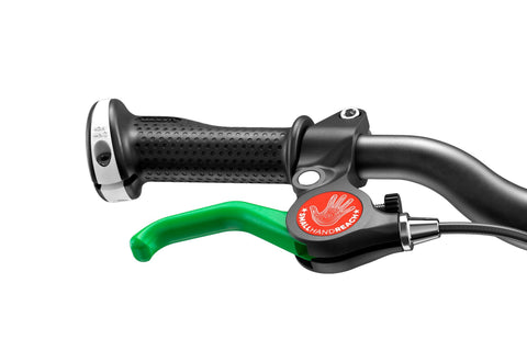 Woom eye-catching green brake lever with ergonomic lock-on grip.