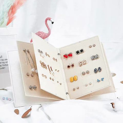 https://nillishome.com/collections/pu/products/portable-travel-jewelry-case-pu-leather-earring-holder-with-book-design-ni-sp037