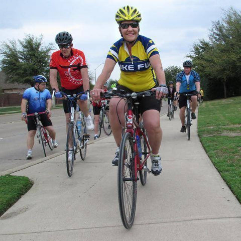 Mayor Betsy Price on a bicycle