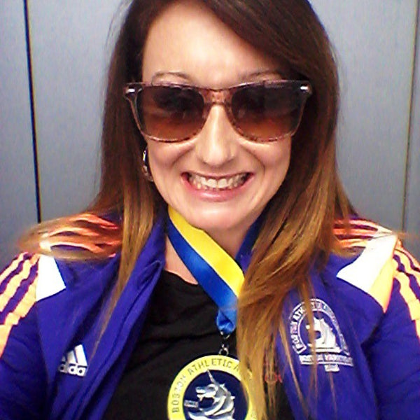 Nicole with her medal