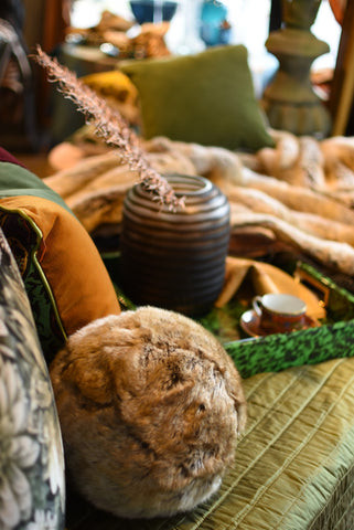 Faux furs make the most splendid layer in cozy throws and fun rounds balls