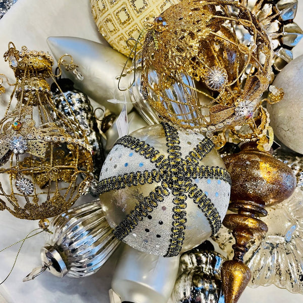 Holiday ornaments in mixed metals