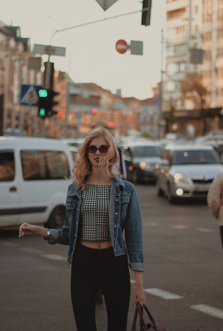 woman in black pant fashion in spring in the city