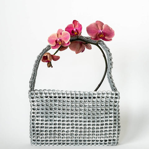 alt="upcycled purse from soda tabs - escama studio"