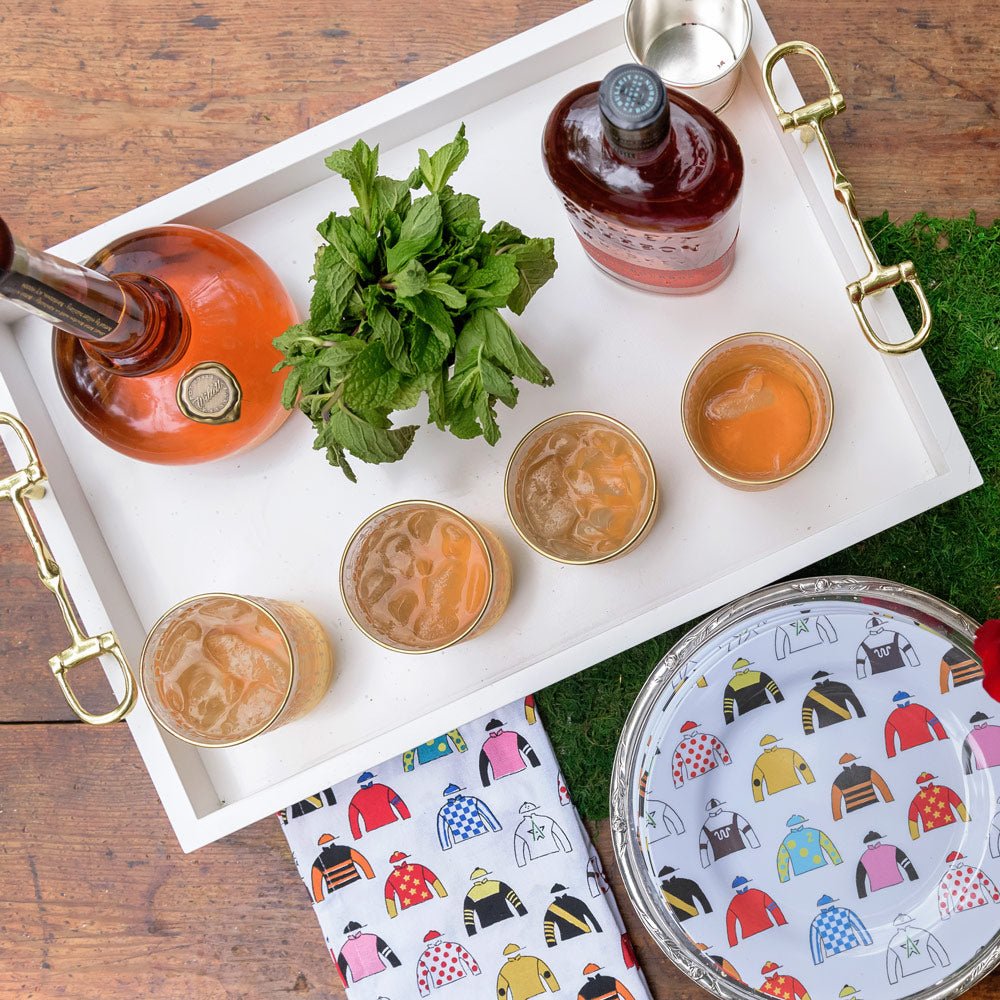 https://cdn.shopify.com/s/files/1/0224/8837/products/Melamine-Serving-Tray-life-1-with-Snaffle-Handles---Small-530051_1600x.jpg?v=1684032053