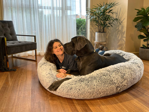 Giant human size dog bed with great dane female woman owner in it too