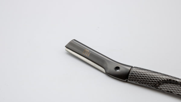 Close up of the dermaplaner tool's blade