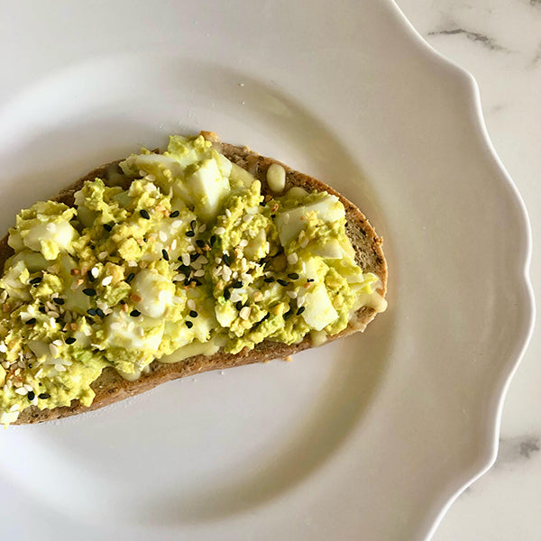 Gluten Free AWG Everything Bread with smashed avocado and egg