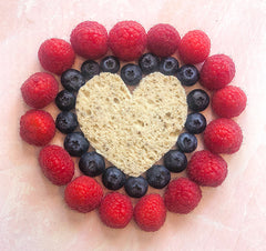 Heart Shape made with exotic berries with Gluten free bread in center