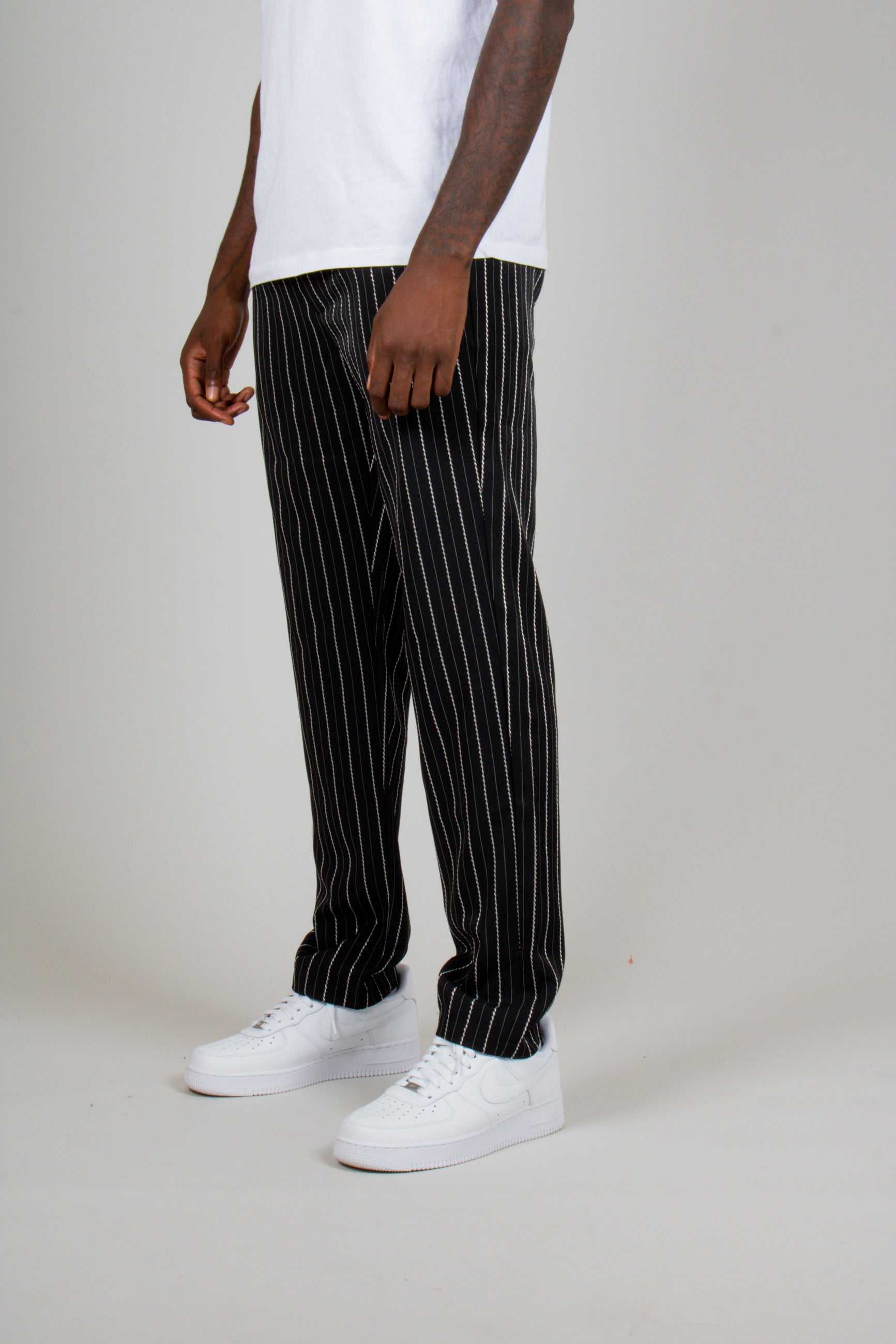 Men's pants with store stripes down the side