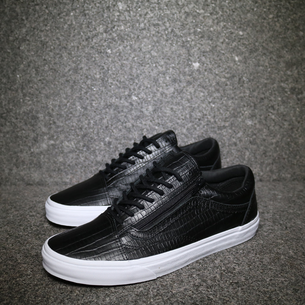 all black vans with white sole