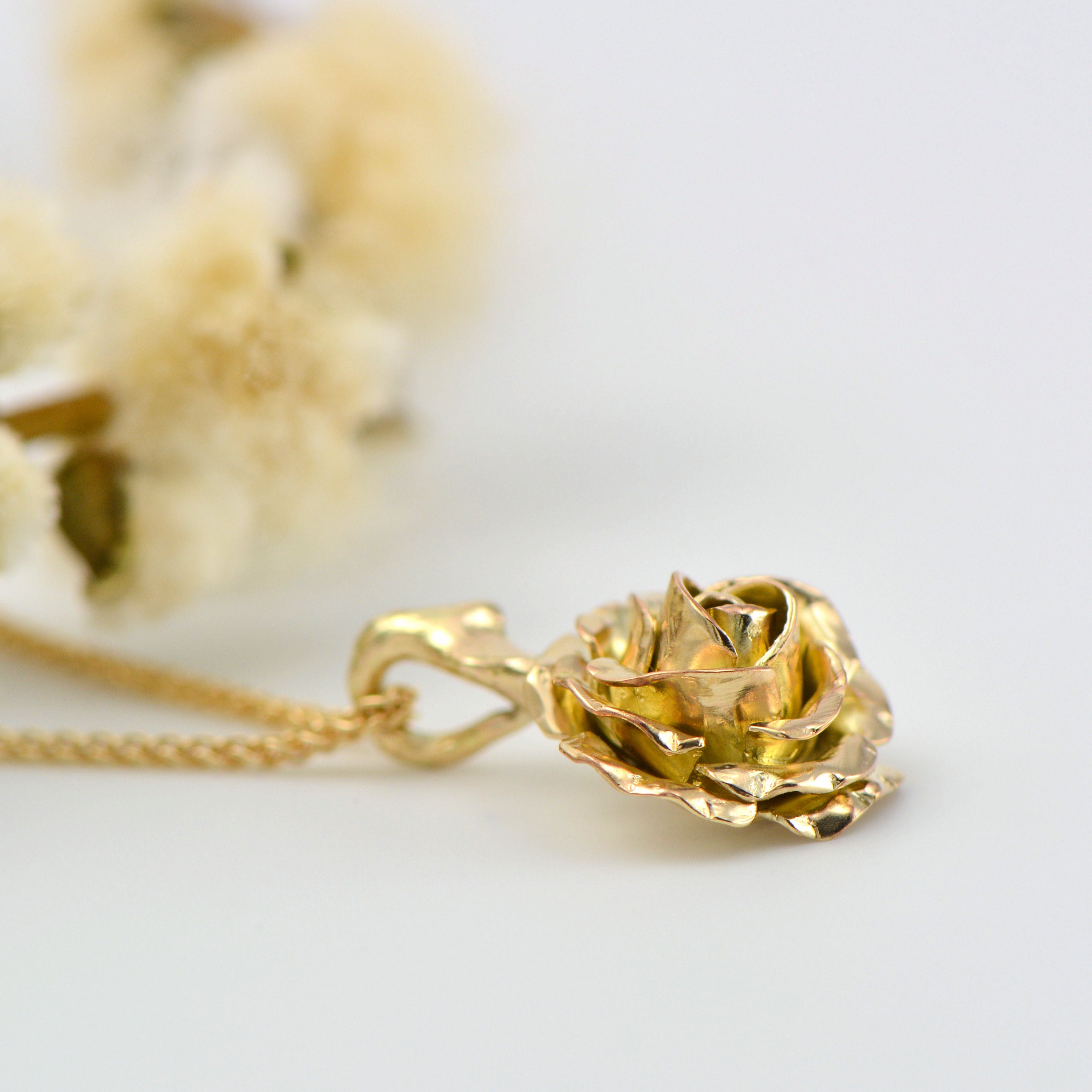 yellow gold rose pendant