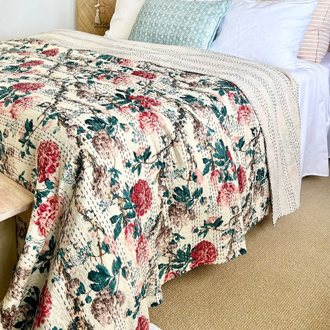 red and white kantha quilt